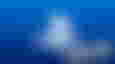 PlayStation logo in white on a blue background with a white and black "CYBER MONDAY DEALS" label next to it.