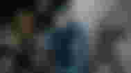 Leon from Resident Evil with two blurry images behind him, one of Outlast, the other of Silent Hill 2.