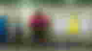 A large red monster with a guy in a blue shirt next to him in a public toilet, with the Dispatch logo in white and yellow next to them.